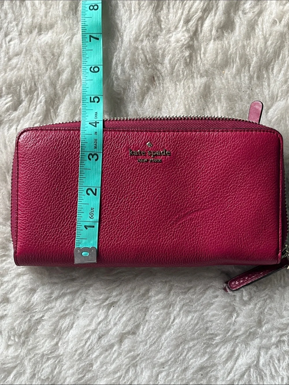 kate spade raspberry pebbled leather zip-around wallet